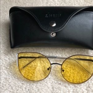 Yellow framed sunglasses